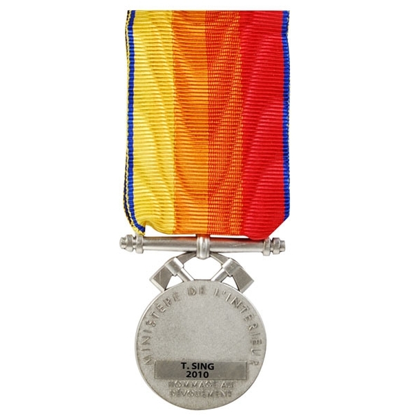Médaille des sapeurs-pompiers en métal argenté gravée